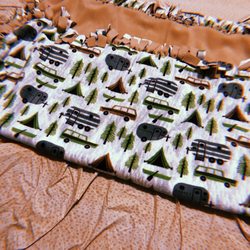 Made this blanket from this great fabric from Joann's! Thanks for the great sale!