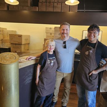 Starbucks - Pat and Zach took a picture with ny husband after showing us how customers used to order beans from the original bar! - Coffee & Tea Near Me - Seattle, Washington