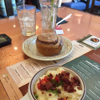 Another Broken Egg Cafe - City Grits with smoke gouda were awesome! And cinnamon roll was warm and with melted cream cheese yum! - Cafes Near Me - Orange Beach, Alabama