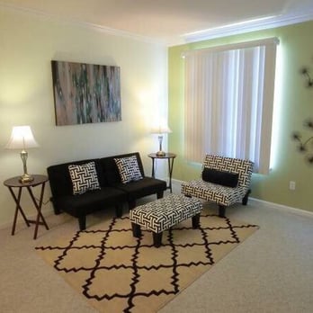 Amstar Designs - The living room is well staged as the selective furniture highlights the space of the living room. - Home Staging Near Me Amstar Designs - The living room is well staged as the selective furniture highlights the space of the living room. - Home Staging Near Me