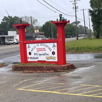 Miles To Adventure - Sign out front - Tabletop Games Near Me - Gulfport, Mississippi