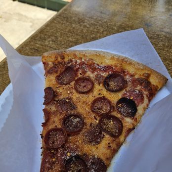 Sisters Pizza - Slice of pepperoni from the display case - Pizza Near Me - San Diego, California Sisters Pizza - Slice of pepperoni from the display case - Pizza Near Me - San Diego, California