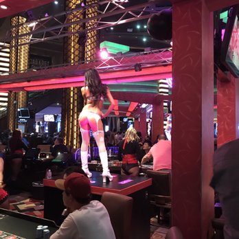 Pleasure Pit - a woman on a casino table - Adult Entertainment Near Me - Las Vegas, Nevada