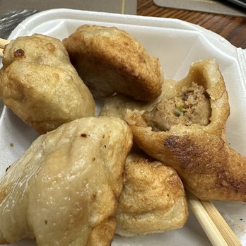 Halal Hunan Village - 11. Chicken Dumplings These were supposed to be fried. They are doughy, clearly not chicken. Straight into the trash, inedible - Chinese Near Me - Ashburn, Virginia