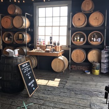 Ironworks Distillery - barrels stacked on the floor - Beer, Wine & Spirits Near Me - Lunenburg, Nova Scotia