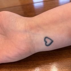 Atomic Tattoo - The stencil was a thin heart and I walked out with a thick ass uneven heart for $80