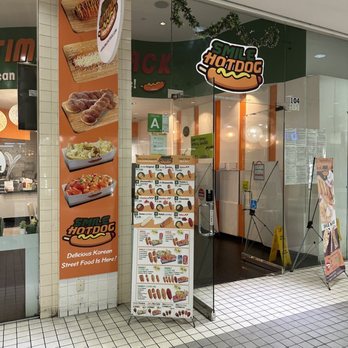 Smile Hotdog - Entrance has a lot of signs and menus - Hot Dogs Near Me - Los Angeles, California Smile Hotdog - Entrance has a lot of signs and menus - Hot Dogs Near Me - Los Angeles, California