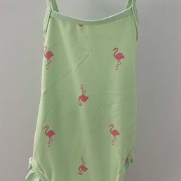 Discounted, my daughter's cute flamingo one-piece swimsuit with crisscross back, cannot believe she went up a size!