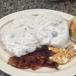 Cathead biscuits, gravy, fried egg and bacon Cathead biscuits, gravy, fried egg and bacon