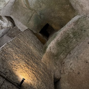 Napoli Sotterranea - Holes in the ceilings indicate where wells or porthole entry points for workers used to exist - Landmarks & Historical Buildings Near Me - Naples, NA