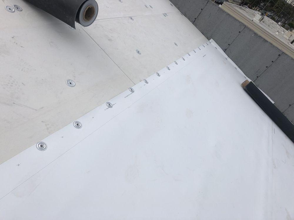 Slide of ARM Roofing Specialists