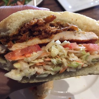 Copper Still Grill - Blackened chicken sandwich on ciabatta.  See the slaw to chicken ratio? It's twice as thick as the meat. And it's bland. - New American Near Me - Monrovia, California