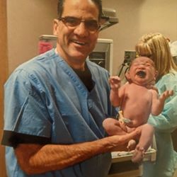 Jose J. Cueto, MD - Dr. Cueto with my son after delivery.