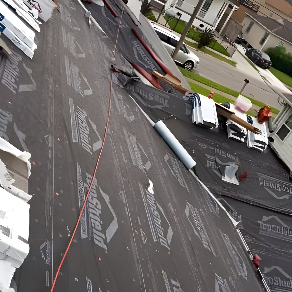 Slide of Big Easy Roofing