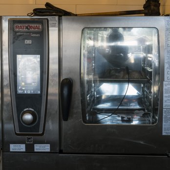 Bushfire Kitchen - Del Mar - Chickens cooking. - American Near Me - Del Mar, California