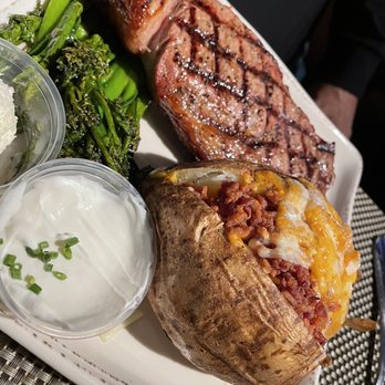 Bailiwick - Ribeye with Fully Loaded Baked Potato - Gastropubs Near Me - Las Vegas, Nevada Bailiwick - Ribeye with Fully Loaded Baked Potato - Gastropubs Near Me - Las Vegas, Nevada