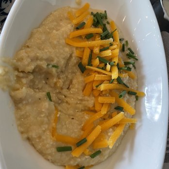 Southern Social - Grits. Tasty but they were not served very warm. They had a little more chew than I'm used to but still good. - Southern Near Me - Eagan, Minnesota