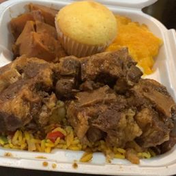 Oxtails, seafood rice, yams and Mac and cheese. Oxtails, seafood rice, yams and Mac and cheese.