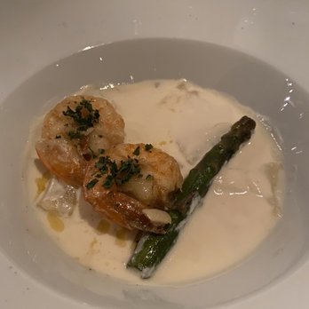 Bluewater Grill - Open faced shrimp ravioli with cheese sauce - Steakhouses Near Me - Cancún, ROO Bluewater Grill - Open faced shrimp ravioli with cheese sauce - Steakhouses Near Me - Cancún, ROO