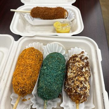 Mochinut - Top (regular with half mozzarella and half hot dog)  Bottom left to right : Doritos, blue takis, Mexican street corn with all cheese. - Donuts Near Me - Ogden, Utah
