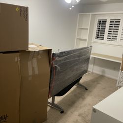 Seraphim Moving - carefully packaging the items to ensure they are protected during transit.