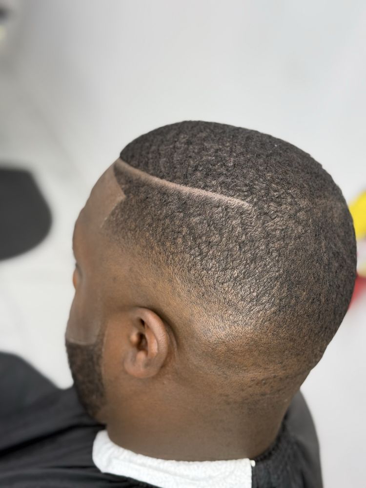 The Elite Dominican Barbershop Logo