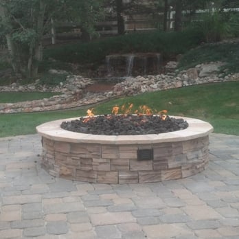 Wildflower Landscape Services - Gas Fire pit with veneer stone set on Paver patio by Wildflower Landscape 303-450-7857 - Landscaping Near Me - Thornton, Colorado Wildflower Landscape Services - Gas Fire pit with veneer stone set on Paver patio by Wildflower Landscape 303-450-7857 - Landscaping Near Me - Thornton, Colorado