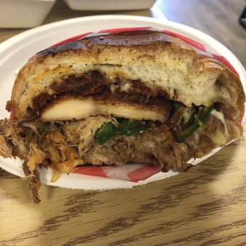 La Torta Loca - Half of a La torta with chicken, chorizo and sausage - Mexican Near Me - Florence, Kentucky La Torta Loca - Half of a La torta with chicken, chorizo and sausage - Mexican Near Me - Florence, Kentucky
