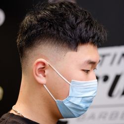 TimothyTrimothy Barber Studio - Mid drop fade