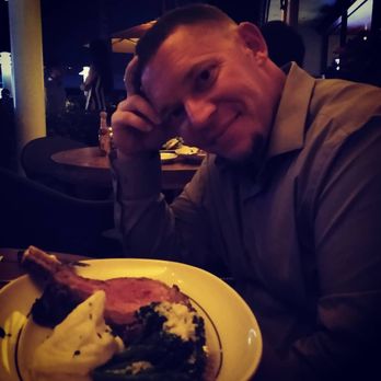 Houston's Restaurant - He's happy with he sees - American Near Me - Pompano Beach, Florida