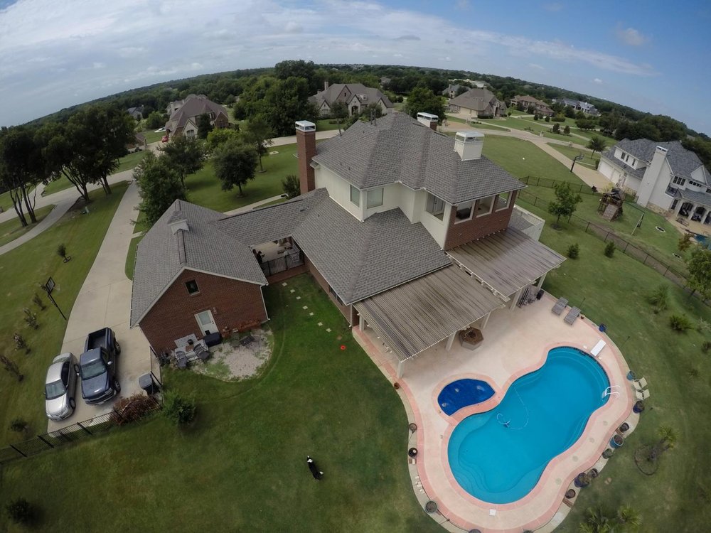 Slide of Texas Roofing and Construction