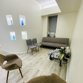 DK Dermatology - Our waiting room, with ample seating, snacks and free WiFi. - Dermatologists Near Me - New York, New York DK Dermatology - Our waiting room, with ample seating, snacks and free WiFi. - Dermatologists Near Me - New York, New York