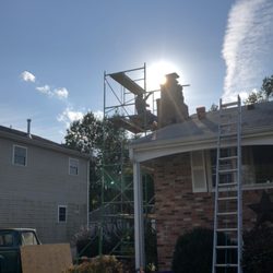 DMV Chimney & Masonry Repair - Chimney Rebuild from Roof Line Up in the Leesburg area.