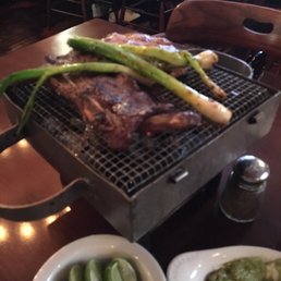 Not the best pic but part of our parrillada para dos. Costillas, res, y pollo. Not the best pic but part of our parrillada para dos. Costillas, res, y pollo.