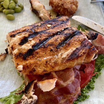 Pop's Sunset Grill - Salmon BLT, edamame salad left upper corner, coconut shrimp upper right corner - Seafood Near Me - Nokomis, Florida