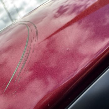 Tesla Collision - Paint bubbles on "repaired" body part - Body Shops Near Me - Orlando, Florida