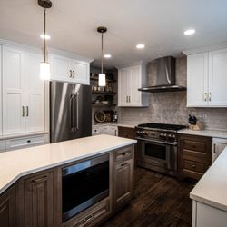 Cabinet-S-Top - Beautiful two-toned kitchen remodel with Medallion Cabinetry in the Biscotti stain finish and Siteline Cabinetry in the Aspen paint finish.