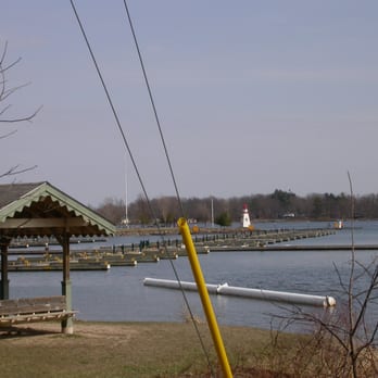 Rotary Beach - View across the Marina to Joel Stone Park from Bay Road. - Beaches Near Me - Gananoque, Ontario Rotary Beach - View across the Marina to Joel Stone Park from Bay Road. - Beaches Near Me - Gananoque, Ontario