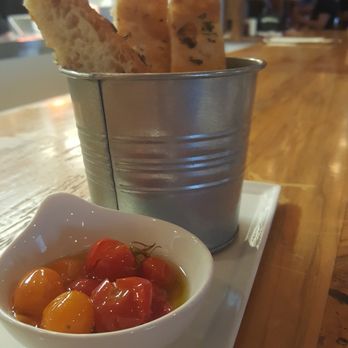 Red Haven - Today's bake: focaccia, rosemary, garlic, cherry tomato config, chili - Tapas/Small Plates Near Me - Okemos, Michigan