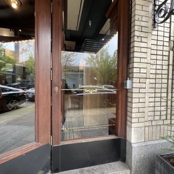 Ace Hotel - Entrance with photo booth signage on the door; $5 - Hotels Near Me - Portland, Oregon