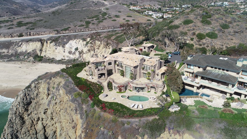 Slide of Coastal Roofing