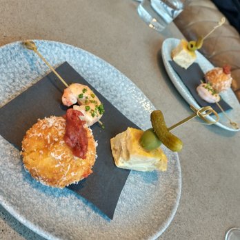 CedarCreek Estate Winery - Bloody Mary shrimp, tortilla de patatas with olive and gerkin, and a fried cheese ball with spiced tomato confit. - Wineries Near Me - Kelowna, British Columbia CedarCreek Estate Winery - Bloody Mary shrimp, tortilla de patatas with olive and gerkin, and a fried cheese ball with spiced tomato confit. - Wineries Near Me - Kelowna, British Columbia