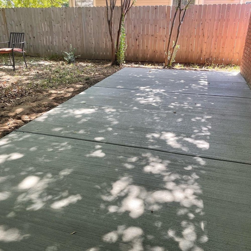 CT Outdoor Services  -  patio with a table and chairs - Irrigation Near Me