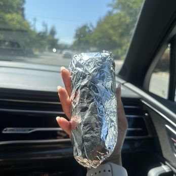 Chipotle Mexican Grill - A burrito smaller than hand that cost $12 dollars - Mexican Near Me - Napa, California Chipotle Mexican Grill - A burrito smaller than hand that cost $12 dollars - Mexican Near Me - Napa, California