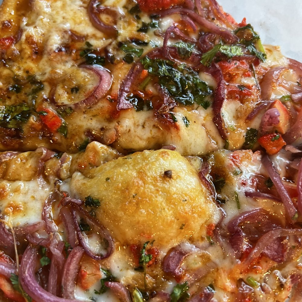 Curry Pizza - Bhindu and butter chicken (on the bottom). So good! - Pizza Near Me - West Valley City, Utah Curry Pizza - Bhindu and butter chicken (on the bottom). So good! - Pizza Near Me - West Valley City, Utah