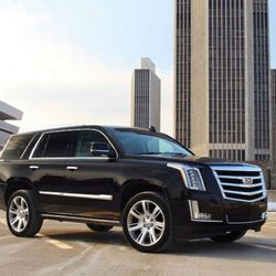 Flat Rate Car Service - How about getting picked up in a Cadillac Escalade? Book one with Flat Rate Car Service.
