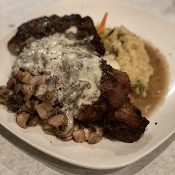 Vintage On 5th - 16 Oz ribeye with mushrooms - New American Near Me - Crystal River, Florida Vintage On 5th - 16 Oz ribeye with mushrooms - New American Near Me - Crystal River, Florida