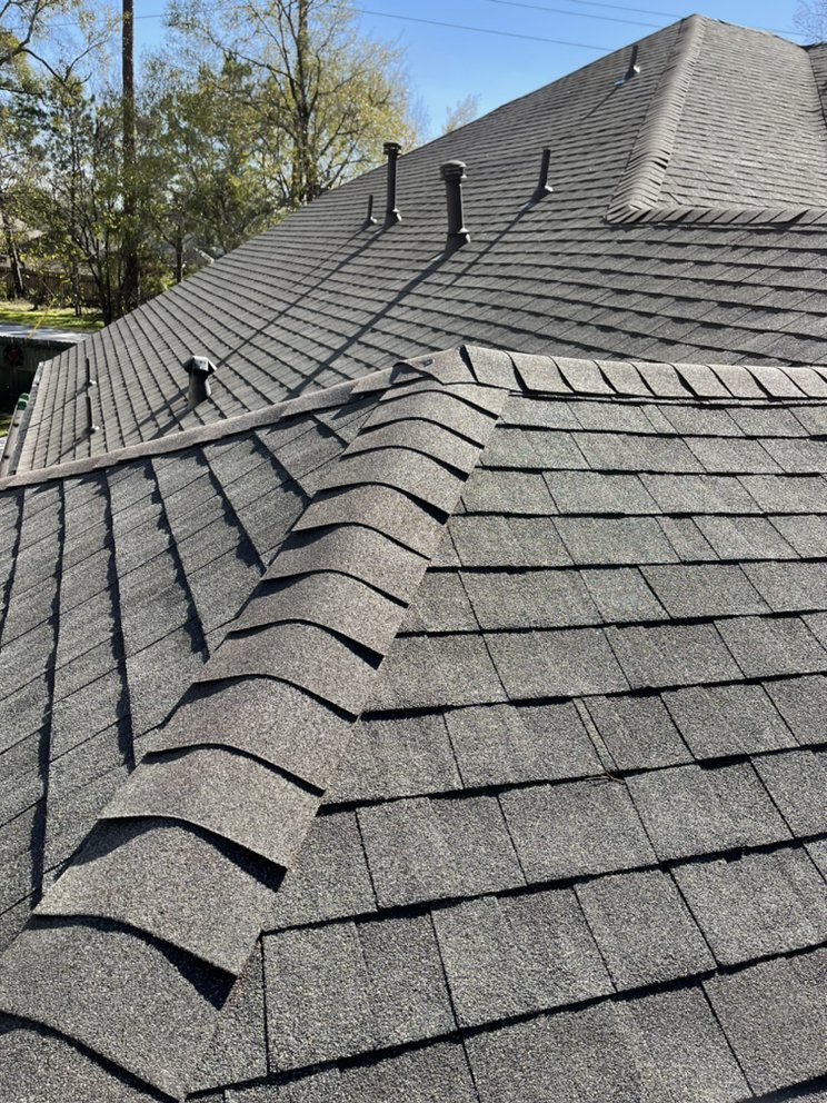 Slide of Reality Roofing