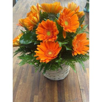 Floral Concepts - Orange gerbera daisy arrangement with greenery, representing Floral Concepts florist in Tomball. - Florists Near Me - Tomball, Texas Floral Concepts - Orange gerbera daisy arrangement with greenery, representing Floral Concepts florist in Tomball. - Florists Near Me - Tomball, Texas