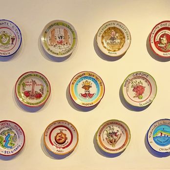 Elvira - Wall decor of plates from different regions of Italy - Italian Near Me - San Diego, California